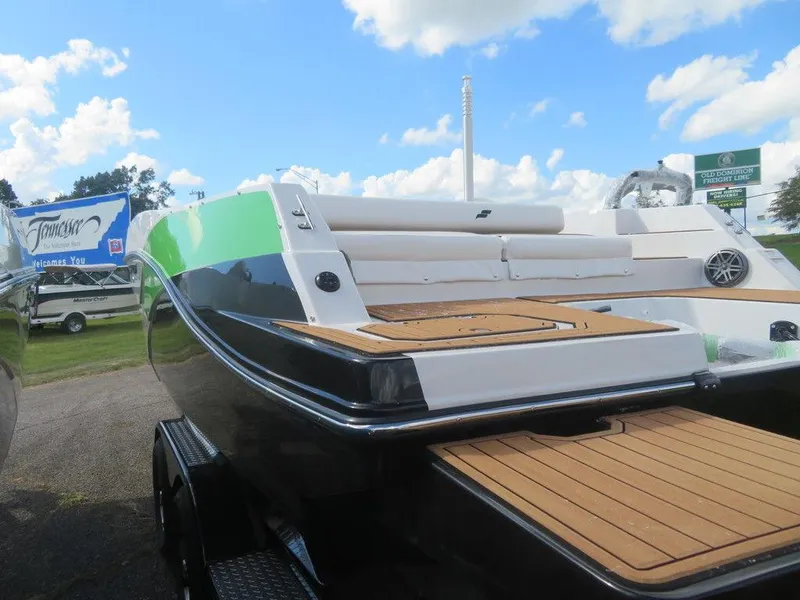 Slide: The Image of 2023 Starcraft SVX OB 231 OB boat with a sleek design and spacious deck. - 3