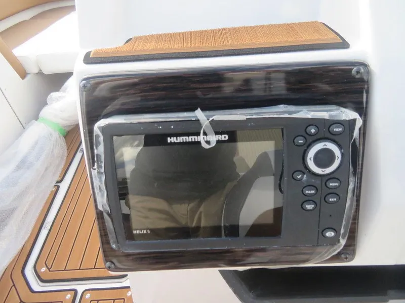 Slide: The Image of 2023 Starcraft SVX OB 231 OB boat with Humminbird Helix fish finder. - 7