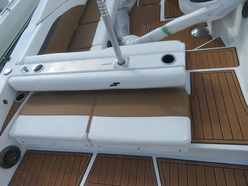 Slide: The Image of 2023 Starcraft SVX OB 231 OB boat interior with brown and white seating. - 8
