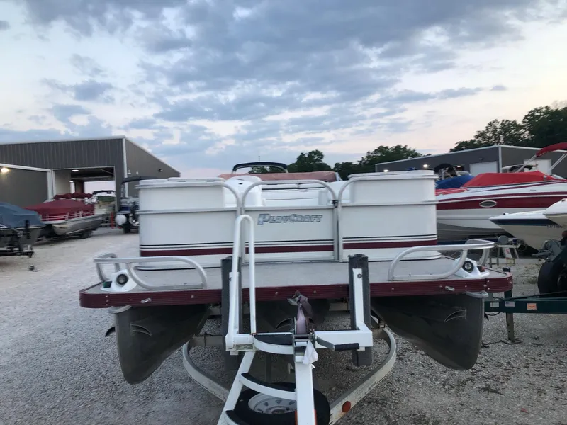 Slide: The Image of 2008 PlayCraft 2600 Clipper pontoon boat on a trailer at a marina. - 4