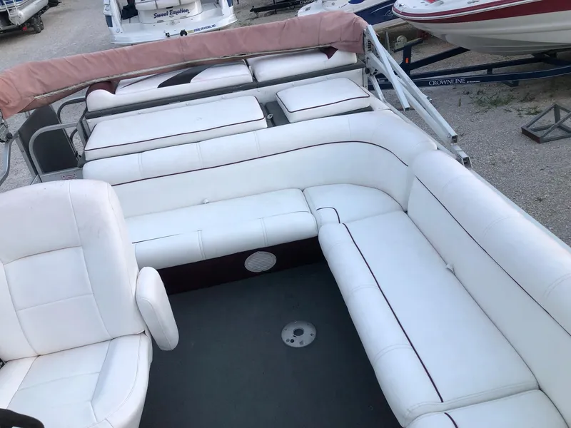 Slide: The Image of 2008 PlayCraft 2600 Clipper boat with white seating and pink canopy. - 8