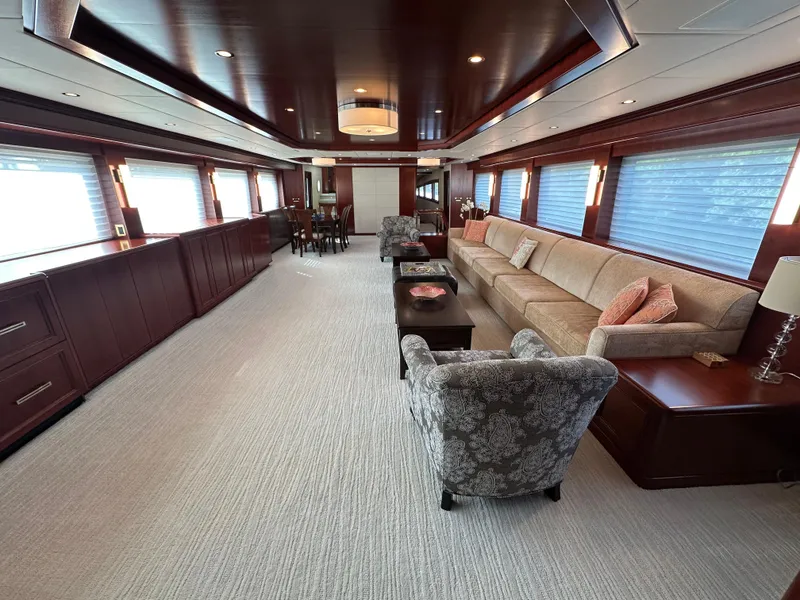 Slide: The Image of Luxurious interior of 2015 Broward Raised Pilothouse M/Y yacht with elegant seating and decor. - 23