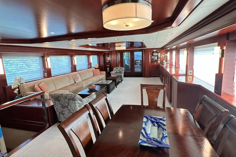 Slide: The Image of Luxurious interior of 2015 Broward Raised Pilothouse M/Y yacht with elegant wood finishes. - 25