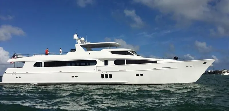 Slide: The Image of Luxury 2015 Broward Raised Pilothouse M/Y yacht cruising on open water. - 3