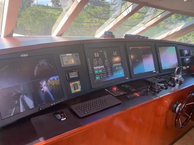 Slide: The Image of Pilothouse of 2015 Broward Raised Pilothouse M/Y with advanced navigation systems and controls. - 39
