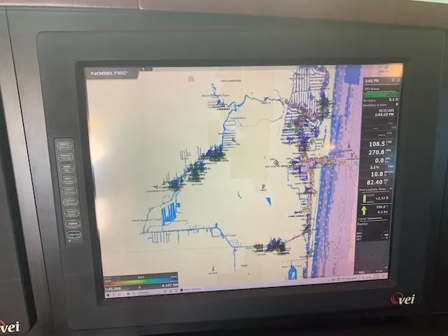 Slide: The Image of Navigation screen on 2015 Broward Raised Pilothouse M/Y yacht displaying coastal map. - 42