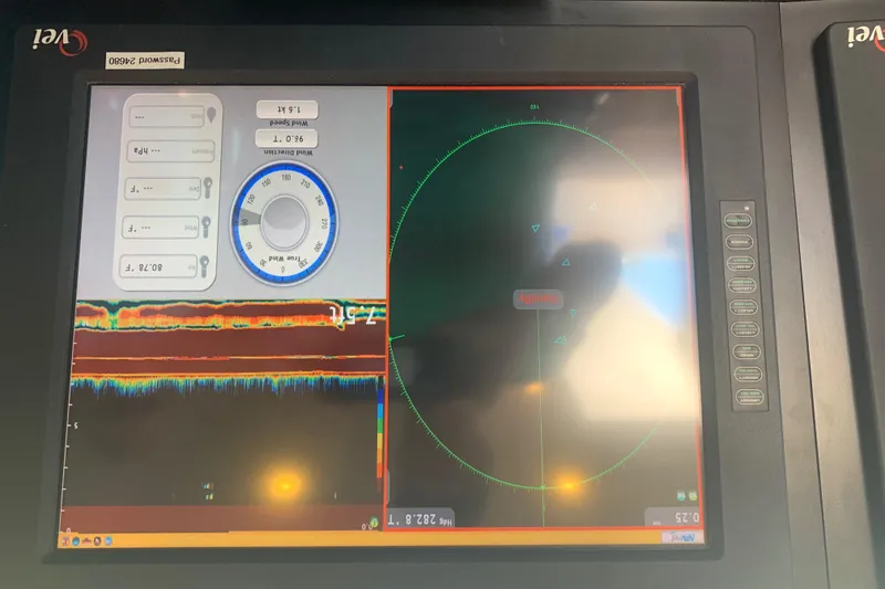 Slide: The Image of Navigation display on Broward Raised Pilothouse M/Y, 2015 model, showing radar and sonar data. - 44