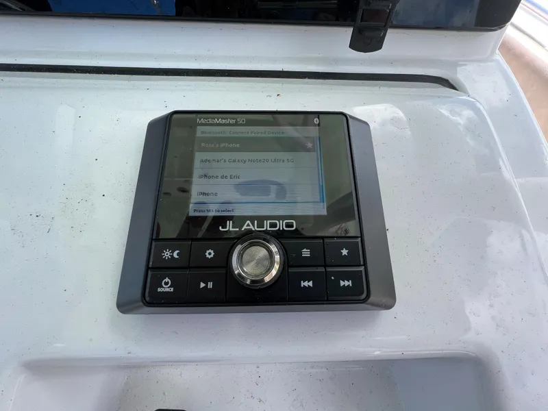 Slide: The Image of JL Audio system on a 2020 Sportsman Heritage 251 Center Console boat. - 14
