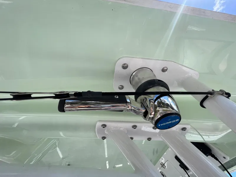 Slide: The Image of Fishing rod holder on a 2020 Sportsman Heritage 251 Center Console boat. - 21