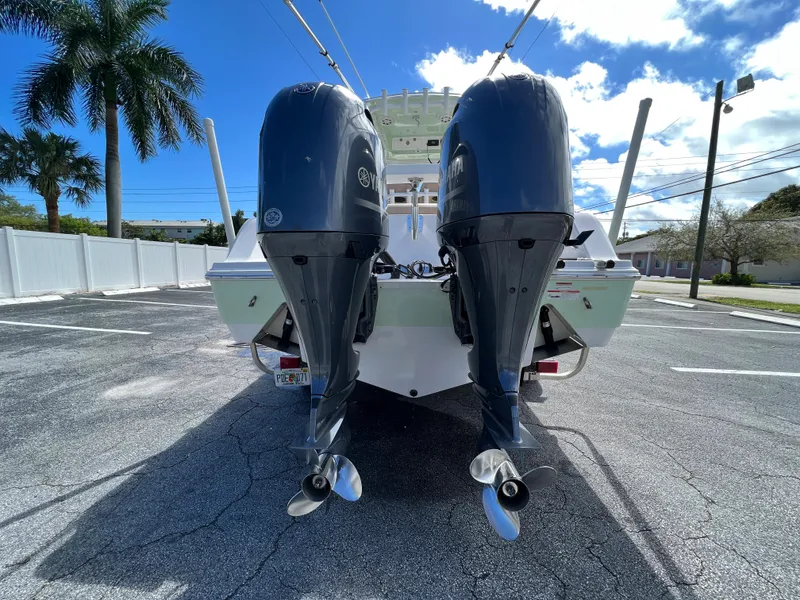 Slide: The Image of 2020 Sportsman Heritage 251 Center Console with twin outboard motors. - 3
