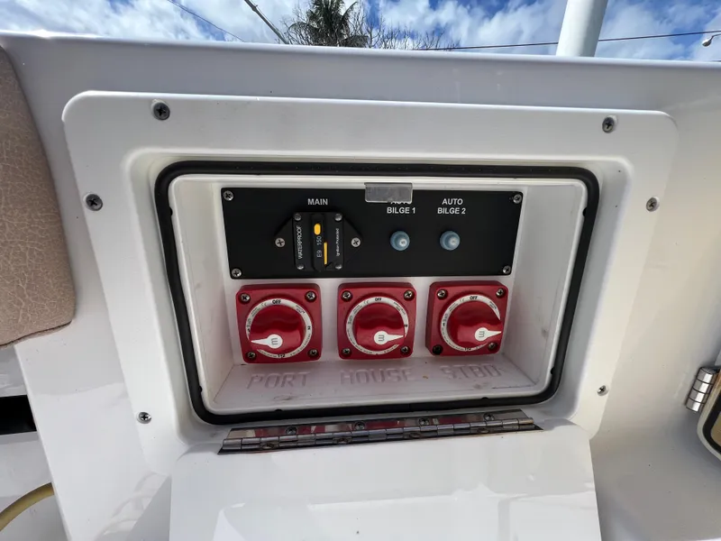Slide: The Image of Control panel of a 2020 Sportsman Heritage 251 Center Console boat. - 33