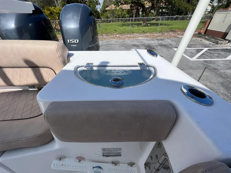 Slide: The Image of 2020 Sportsman Heritage 251 Center Console boat with dual 150 HP engines. - 34