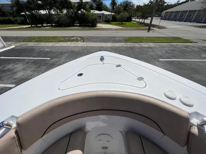 Slide: The Image of 2020 Sportsman Heritage 251 Center Console boat bow view in a parking lot. - 41