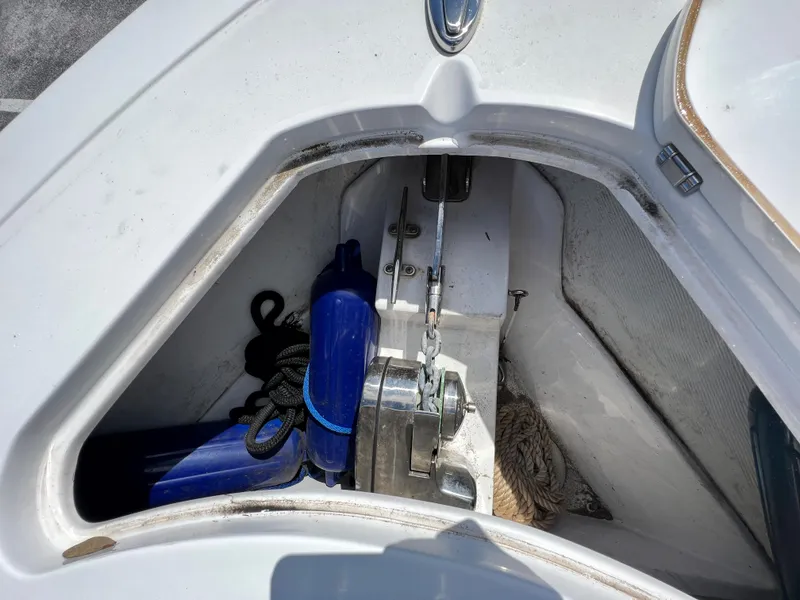 Slide: The Image of Anchor storage compartment on a 2020 Sportsman Heritage 251 Center Console boat. - 42