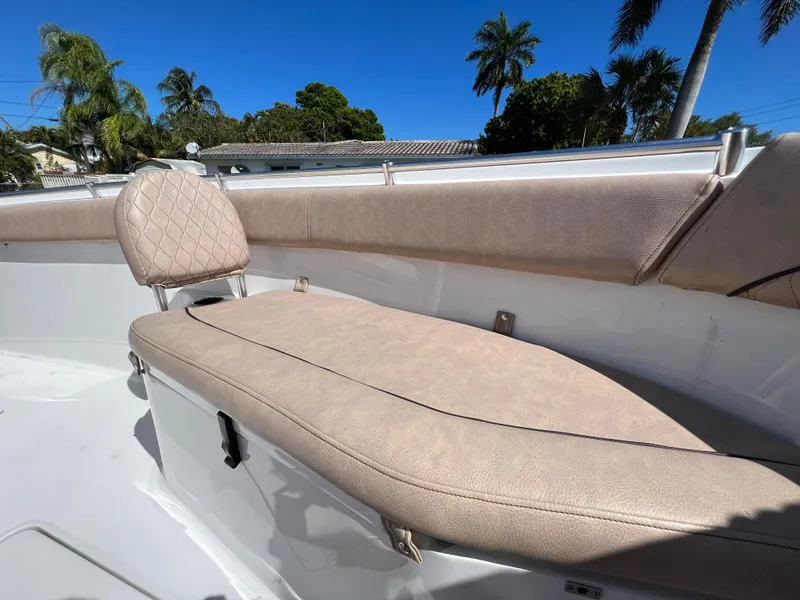 Slide: The Image of 2020 Sportsman Heritage 251 Center Console boat with cushioned seating. - 45