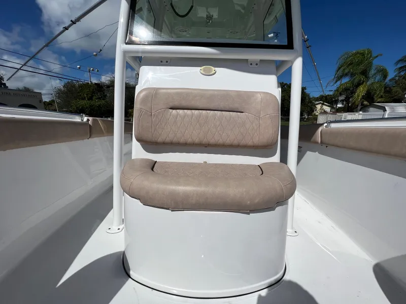 Slide: The Image of 2020 Sportsman Heritage 251 Center Console boat interior with cushioned seating. - 47