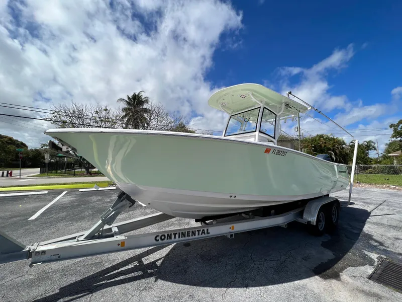 Slide: The Image of 2020 Sportsman Heritage 251 Center Console boat on Continental trailer. - 5