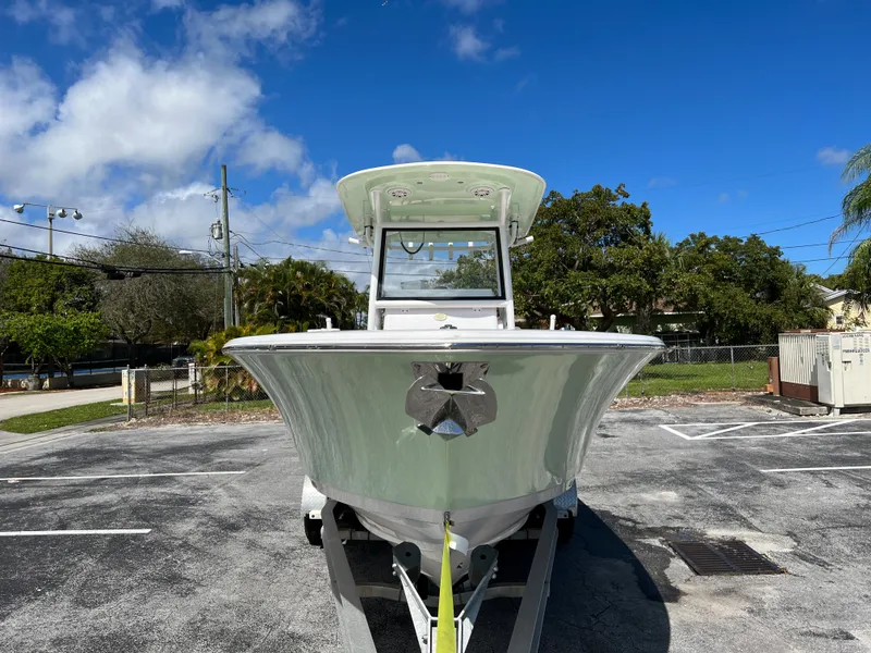 Slide: The Image of 2020 Sportsman Heritage 251 Center Console boat on trailer in parking lot. - 6