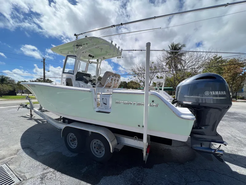Slide: The Image of 2020 Sportsman Heritage 251 Center Console boat on trailer with Yamaha outboard motor. - 8