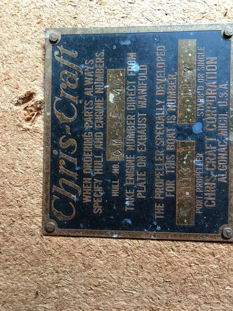 Slide: The Image of 1954 Chris-Craft Commander identification plate with model and engine details. - 31