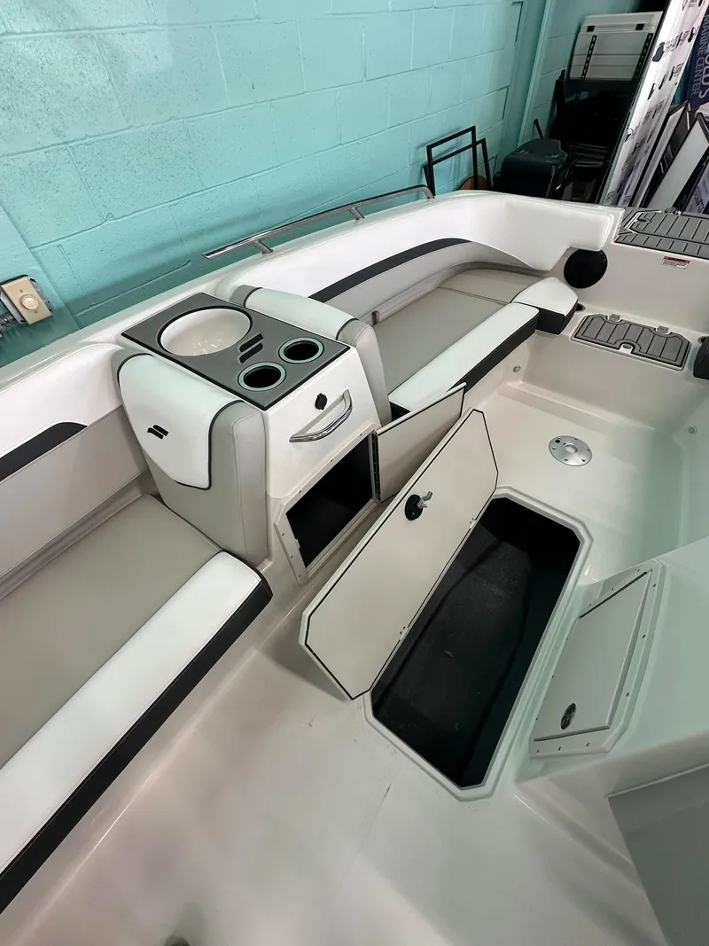 Slide: The Image of 2025 Starcraft SVX 211 OB boat interior with seating and modern design. - 10