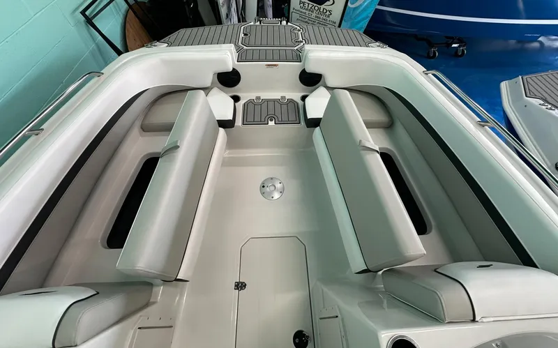 Slide: The Image of 2025 Starcraft SVX 211 OB boat interior with modern dashboard and seating. - 13