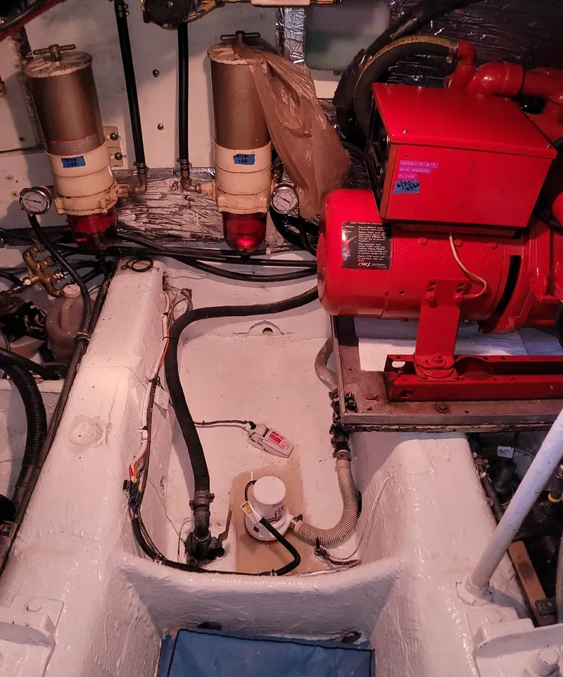 Slide: The Image of Engine room of a 1983 Ocean Yachts Super Sport boat. - 27