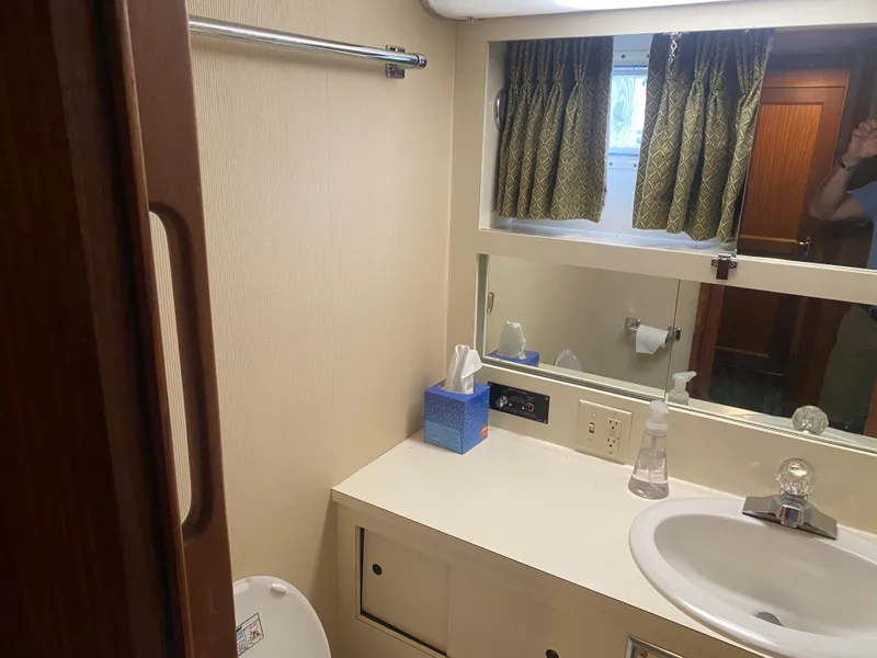 Slide: The Image of Bathroom interior of 1983 Hatteras 53 Extended Deckhouse Motor Yacht with sink and mirror. - 17