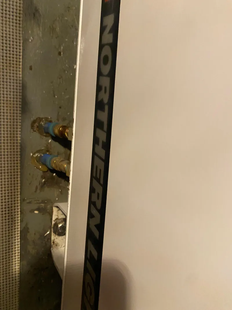 Slide: The Image of 1983 Hatteras 53 Motor Yacht engine room with Northern Lights generator. - 21