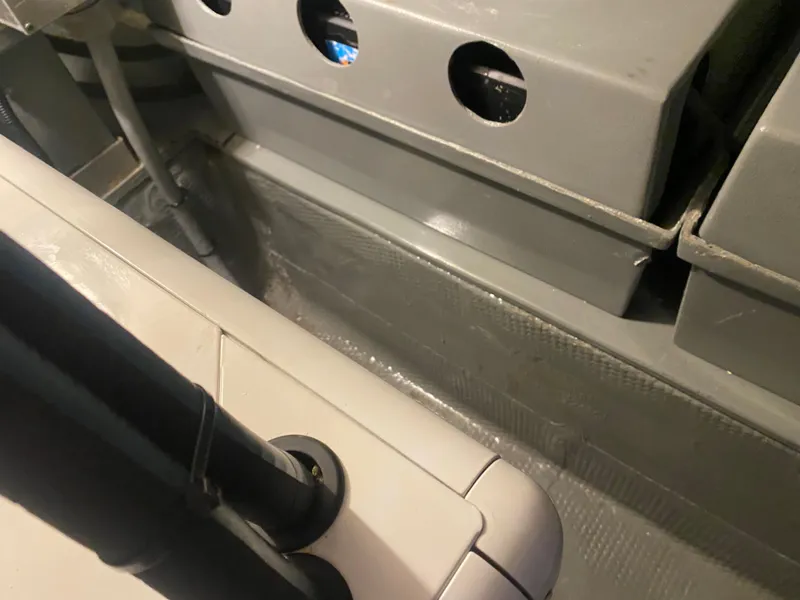 Slide: The Image of 1983 Hatteras 53 Motor Yacht interior, showcasing engine room details and components. - 25