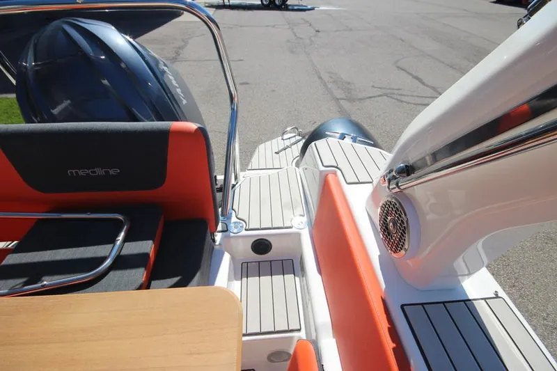 Slide: The Image of 2022 Zodiac Medline 7.5 NEO boat interior with seating and deck details. - 11