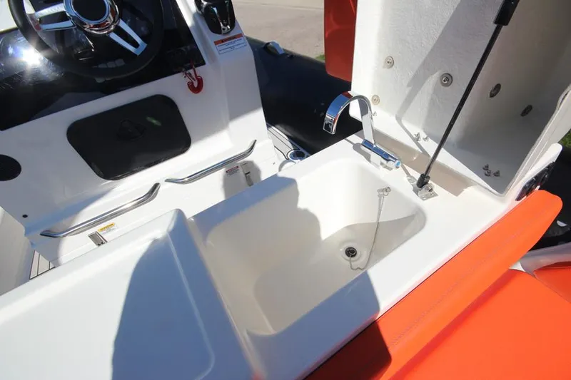 Slide: The Image of 2022 Zodiac Medline 7.5 NEO boat interior with sink and faucet. - 17