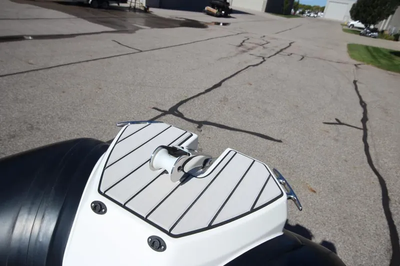 Slide: The Image of 2022 Zodiac Medline 7.5 NEO boat detail, docked on asphalt surface. - 29