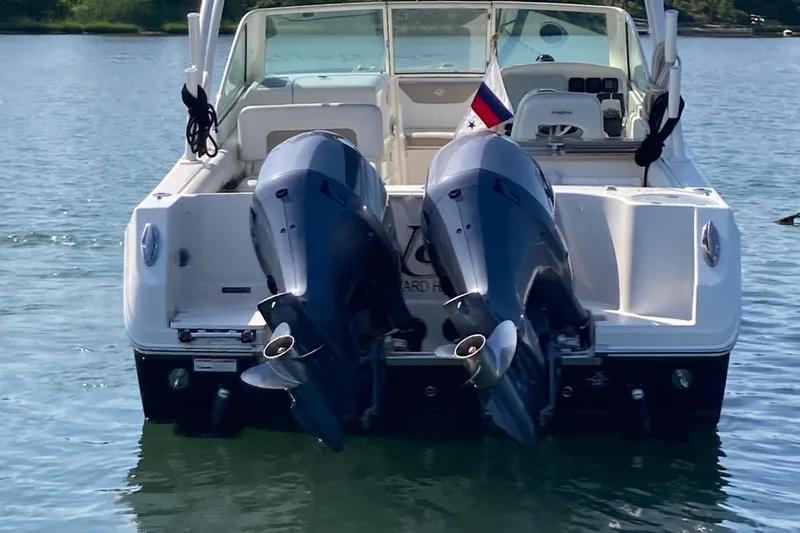 Slide: The Image of 2015 Sailfish 275 DC boat with dual outboard engines. - 4