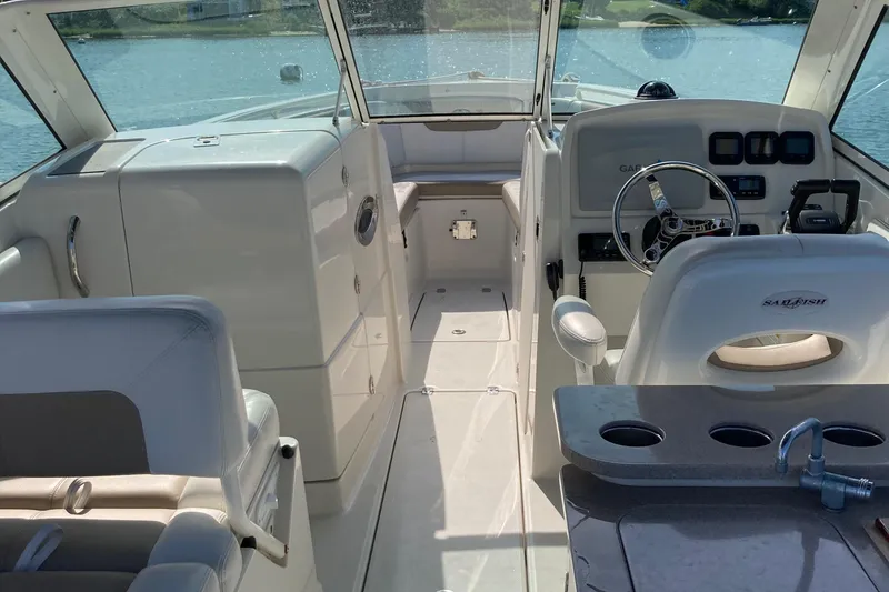 Slide: The Image of Interior of a 2015 Sailfish 275 DC boat with helm station. - 5