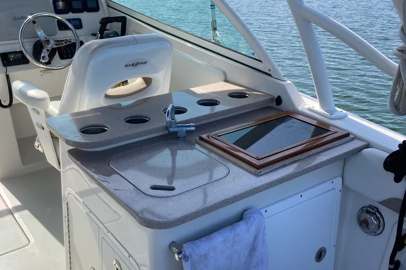 Slide: The Image of Interior view of a 2015 Sailfish 275 DC boat with helm station. - 6