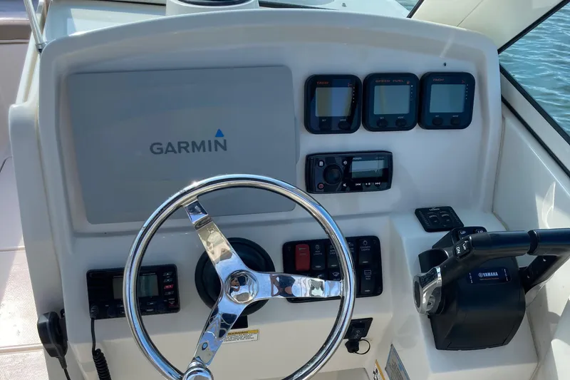 Slide: The Image of 2015 Sailfish 275 DC helm with Garmin equipment. - 7