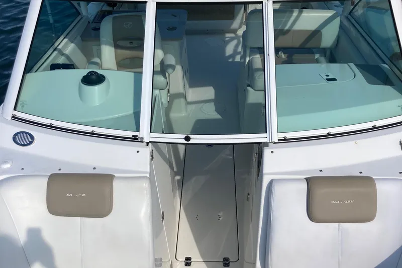 Slide: The Image of Sailfish 275 DC 2015 boat, interior view, white and beige seats. - 9