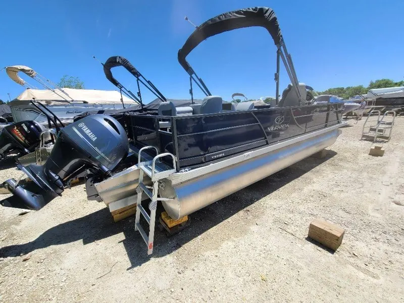 Slide: The Image of 2022 Veranda VF22F4 Deluxe Tri-Toon pontoon boat with Yamaha outboard motor. - 2