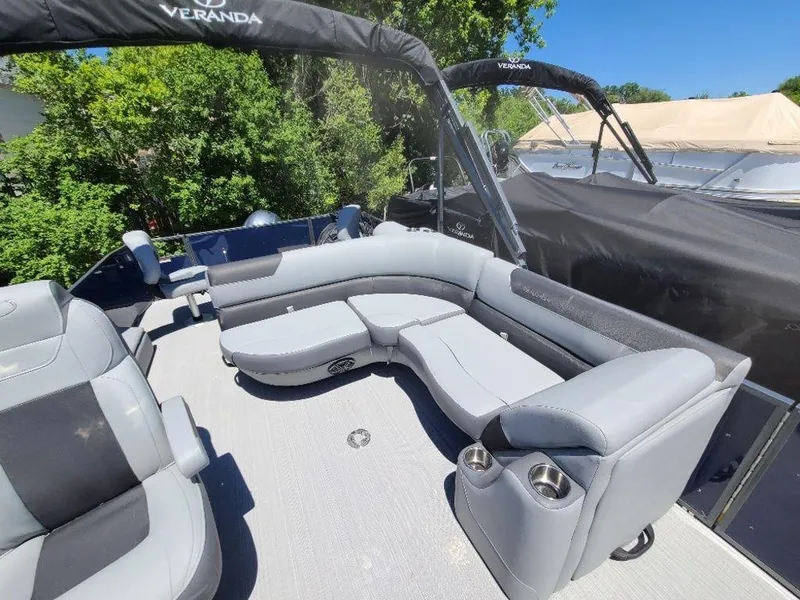Slide: The Image of 2022 Veranda VF22F4 Deluxe Tri-Toon with luxurious seating and cup holders. - 6