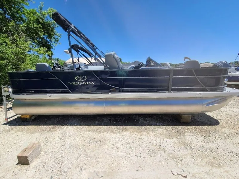 Slide: The Image of 2022 Veranda VF22F4 Deluxe Tri-Toon pontoon boat on land. - 9