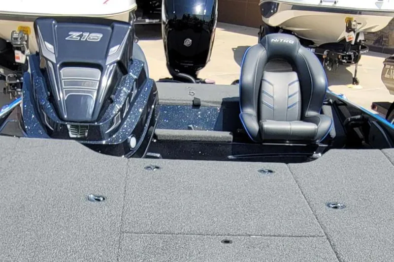 Slide: The Image of 2023 Nitro Z18 boat interior with seating and motor. - 3