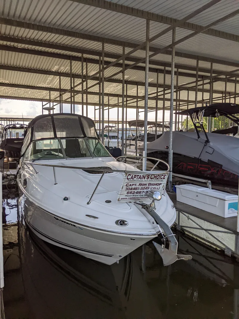 The Image of 2005 Sea Ray 260 Sundancer docked in marina. - 0