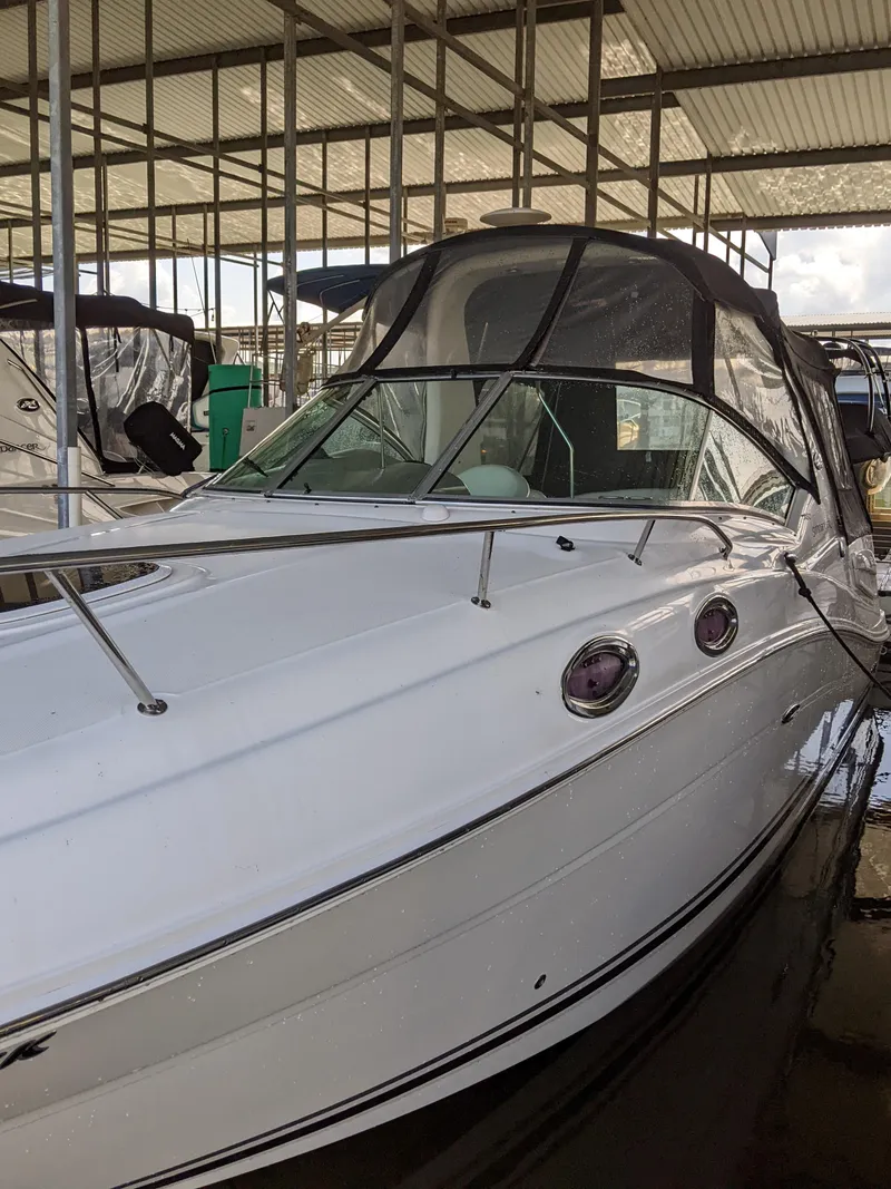 Slide: The Image of 2005 Sea Ray 260 Sundancer in covered dock. - 2