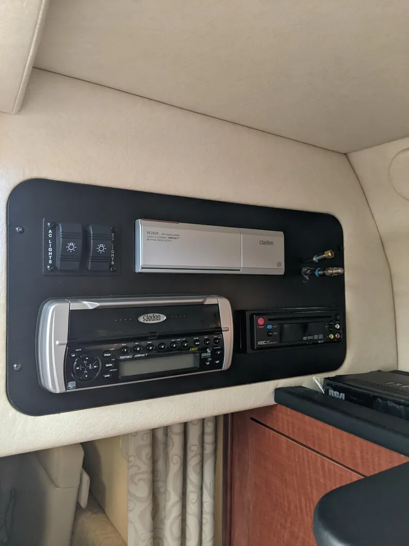 Slide: The Image of Sea Ray 260 Sundancer 2005 kitchenette with cooler. - 23