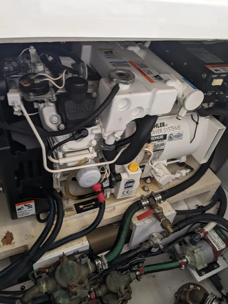 Slide: The Image of Interior of 2005 Sea Ray 260 Sundancer with bed and TV. - 35