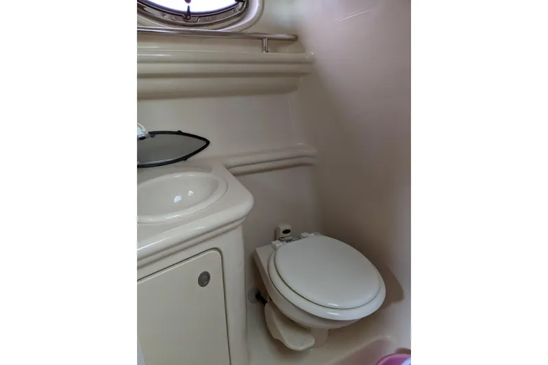 Slide: The Image of 2005 Sea Ray Sundancer 260 boat bathroom with sink and toilet. - 42