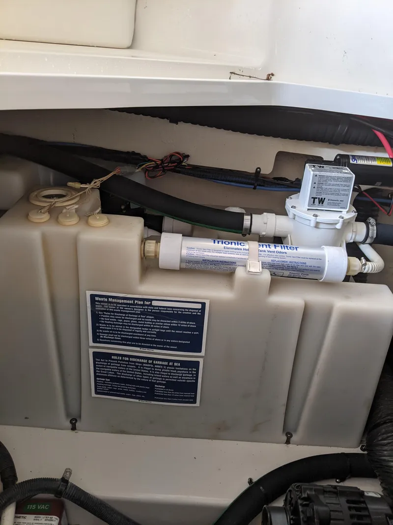 Slide: The Image of Water filtration system in a 2005 Sea Ray 260 Sundancer. - 50