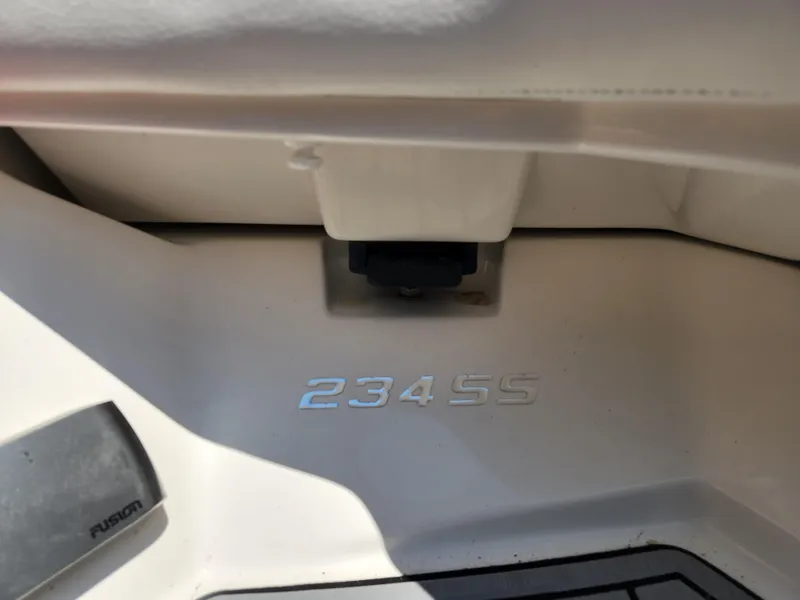 Slide: The Image of 2014 Monterey 234 SS boat interior detail with model number. - 11