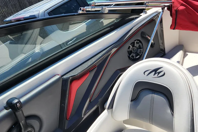 Slide: The Image of 2014 Monterey 234 SS boat interior with red and black accents. - 16